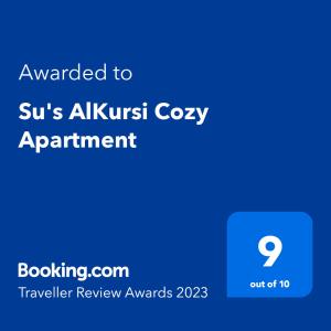 Et logo, certifikat, skilt eller en pris der bliver vist frem på Su's AlKursi Cozy Apartment