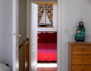 Postel nebo postele na pokoji v ubytování Gîte Les 3 Voiles