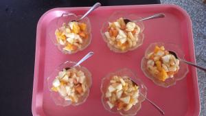 a pink tray with eight candy apples and nuts at Astra in Agerola