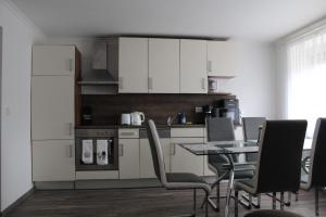 Kuchyň nebo kuchyňský kout v ubytování Eisenerzer Apartmenthaus