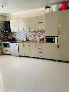 A kitchen or kitchenette at your house in batumi