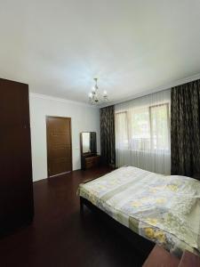 A bed or beds in a room at your house in batumi