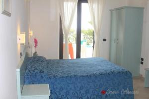 Letto o letti in una camera di Hotel Piccolo Paradiso Del Gargano