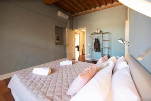 Posteľ alebo postele v izbe v ubytovaní Casa della Luce Luxury