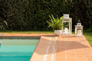 The swimming pool at or close to Casetta di Butia, Ginestra apartment with swimming pool