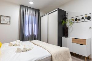 Posteľ alebo postele v izbe v ubytovaní DITO - 4 stars