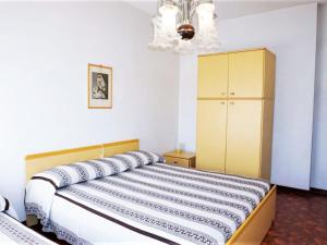 Ένα ή περισσότερα κρεβάτια σε δωμάτιο στο Holiday Home near Spiaggia Tartaruga Beach