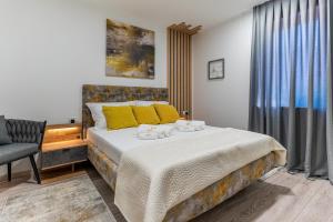 Posteľ alebo postele v izbe v ubytovaní DITO - 4 stars