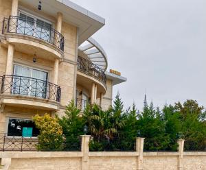 a building with balconies on the side of it at Blackmoon Villa Edirne in Edirne