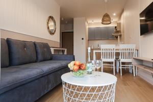 Kuchyňa alebo kuchynka v ubytovaní M&K Apartamenty Morska Fala, Gdańsk - Wyspa Sobieszewska