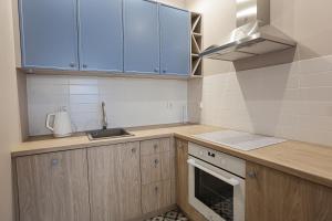 Kuchyňa alebo kuchynka v ubytovaní M&K Apartamenty Morska Fala, Gdańsk - Wyspa Sobieszewska