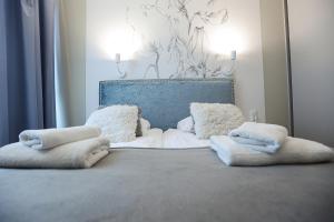 Posteľ alebo postele v izbe v ubytovaní M&K Apartamenty Morska Fala, Gdańsk - Wyspa Sobieszewska
