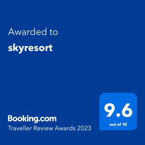 um ecrã azul com o texto atualizado para o sky resort em skyresort em Tangalle