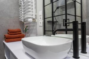 Kúpeľňa v ubytovaní Z Widokiem Apartamenty Świerkowe 10