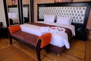 Een bed of bedden in een kamer bij Washington Hotel
