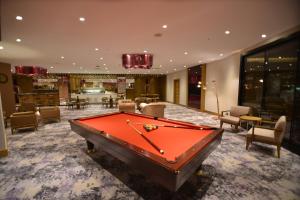 a pool table in the middle of a room at Crowne Plaza Florya Istanbul by IHG in Istanbul