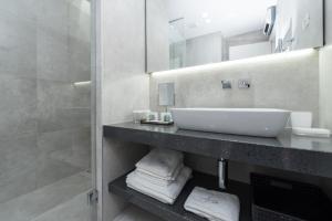 Vonios kambarys apgyvendinimo įstaigoje Artis Accommodation Lux