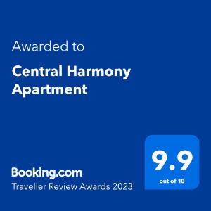 Ett certifikat, pris eller annat dokument som visas upp på Central Harmony Apartment