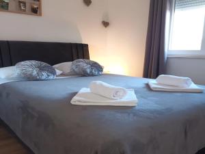 Postel nebo postele na pokoji v ubytování Holiday Home Gabi
