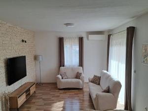 TV a/nebo společenská místnost v ubytování Holiday Home Gabi