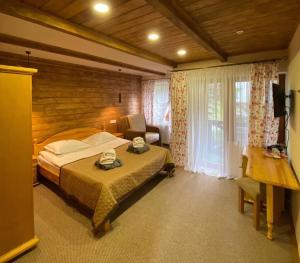 Posteľ alebo postele v izbe v ubytovaní GORGANY resort & SPA