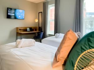Postel nebo postele na pokoji v ubytování Nap Bristol East