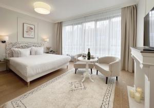 Łóżko lub łóżka w pokoju w obiekcie Kurkowa Apartments