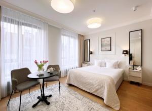 Łóżko lub łóżka w pokoju w obiekcie Kurkowa Apartments