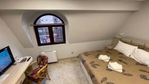 Letto o letti in una camera di City SMART