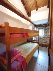 Un ou plusieurs lits superposés dans un hébergement de l'établissement Gite Castagnere 4* en Cévennes
