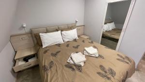 Letto o letti in una camera di City SMART