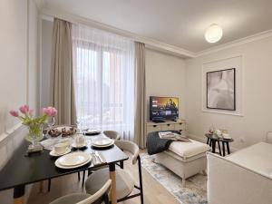 Telewizja i/lub zestaw kina domowego w obiekcie Kurkowa Apartments