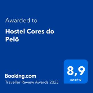 um sinal azul com o texto atribuído aos núcleos hospitalares do em Hostel Cores do Pelô em Salvador