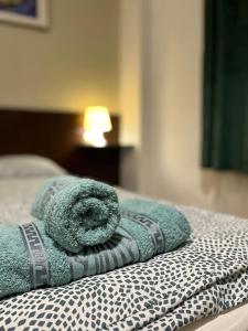 Posteľ alebo postele v izbe v ubytovaní 1#Parliament Sunflower Apartments Room