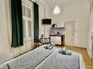 Posteľ alebo postele v izbe v ubytovaní 2# Sunflower Cozy Apartment