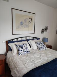 Ένα ή περισσότερα κρεβάτια σε δωμάτιο στο Umbriahouse