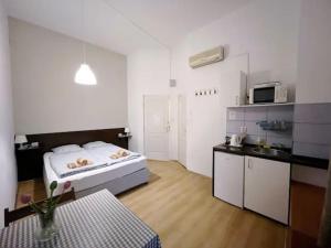 Posteľ alebo postele v izbe v ubytovaní A3 Parliament Sunflower Cozy Apartment