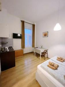 Posteľ alebo postele v izbe v ubytovaní A3 Parliament Sunflower Cozy Apartment + 18 fotografií