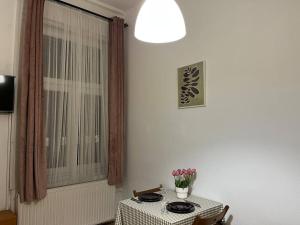 Televízia a/alebo spoločenská miestnosť v ubytovaní A3 Parliament Sunflower Cozy Apartment