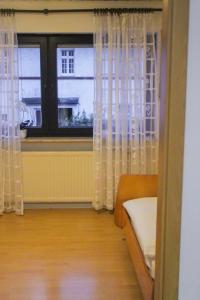 Postel nebo postele na pokoji v ubytování Ferienhaus Seilerbahn 17