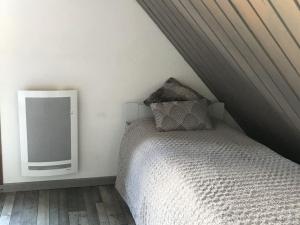 Ένα ή περισσότερα κρεβάτια σε δωμάτιο στο Chalet Mitoyen - 3 Pièces, 7 Pers. - Résidence Les Flocons du Soleil, La Joue du Loup, Dévoluy - FR-1-504-442