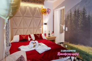Posteľ alebo postele v izbe v ubytovaní Serce Tatr Residence Zakopane - blisko Krupówek