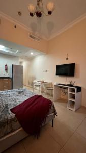 Postel nebo postele na pokoji v ubytování 1-комнатная квартира с кухней в районе Dubai Marina