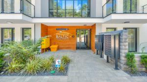 Ogród w obiekcie Apartamenty Sun & Snow Baltic Apartments z basenem