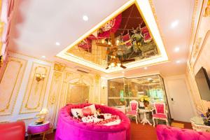 Posezení v ubytování King's Hotel Linh Đàm 1 + 37 fotografií