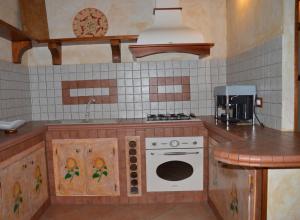 A kitchen or kitchenette at Casa Nicola