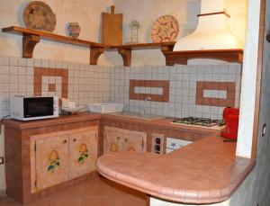 A kitchen or kitchenette at Casa Nicola