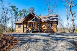 a log home with a large driveway at Rustic Retreat in Ellijay