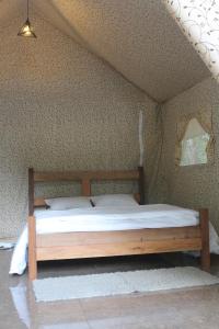 Cama o camas de una habitación en ELA Glamping Madikeri