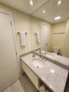 Phòng tắm tại Estudio mobiliado excelente localização em POA
